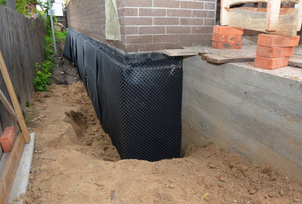 SJ Waterproofing Pros technician performing targeted Vapor Barrier Installation assessment in Deer Lodge, TN